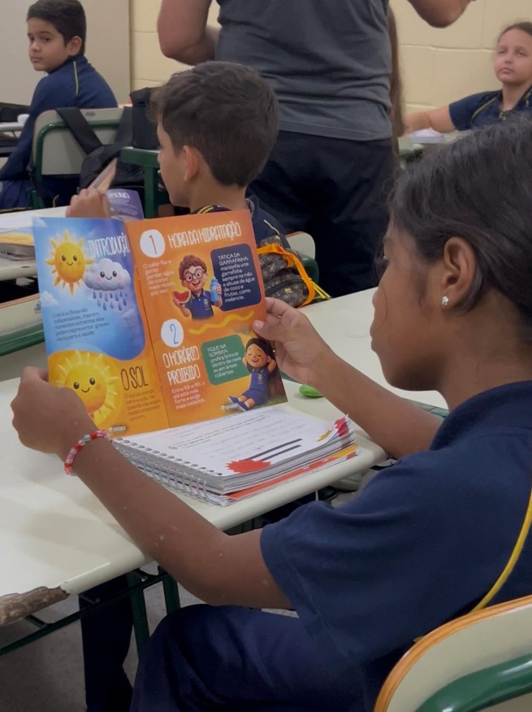 Cartilha ilustrada orienta alunos sobre o clima Foto 03