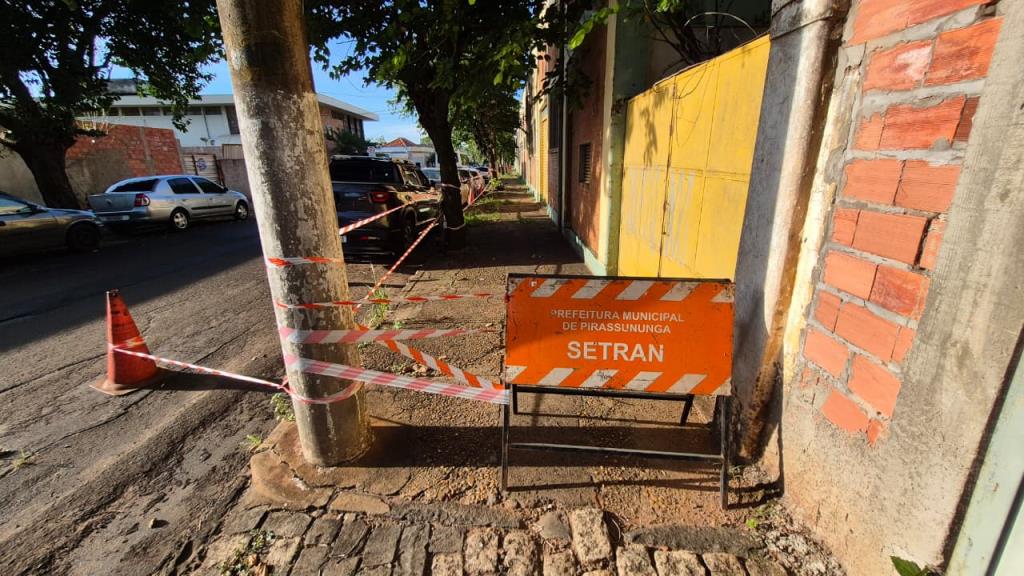 Interdição temporária de prédio, passeio público e estacionamento