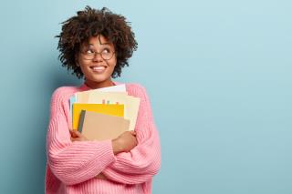 young-woman-with-afro-haircut-wearing-pink-sweater