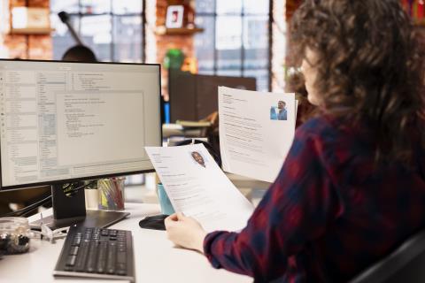 startup-hr-worker-identifying-right-candidates-job-opening-reviewing-resume