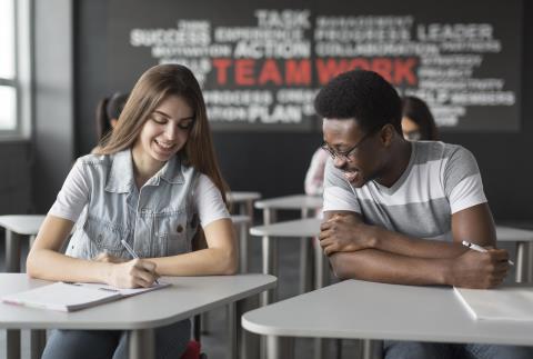 medium-shot-smiley-students-classroom