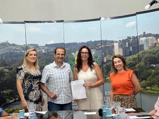 Entrega do Termo de posse para a TDM